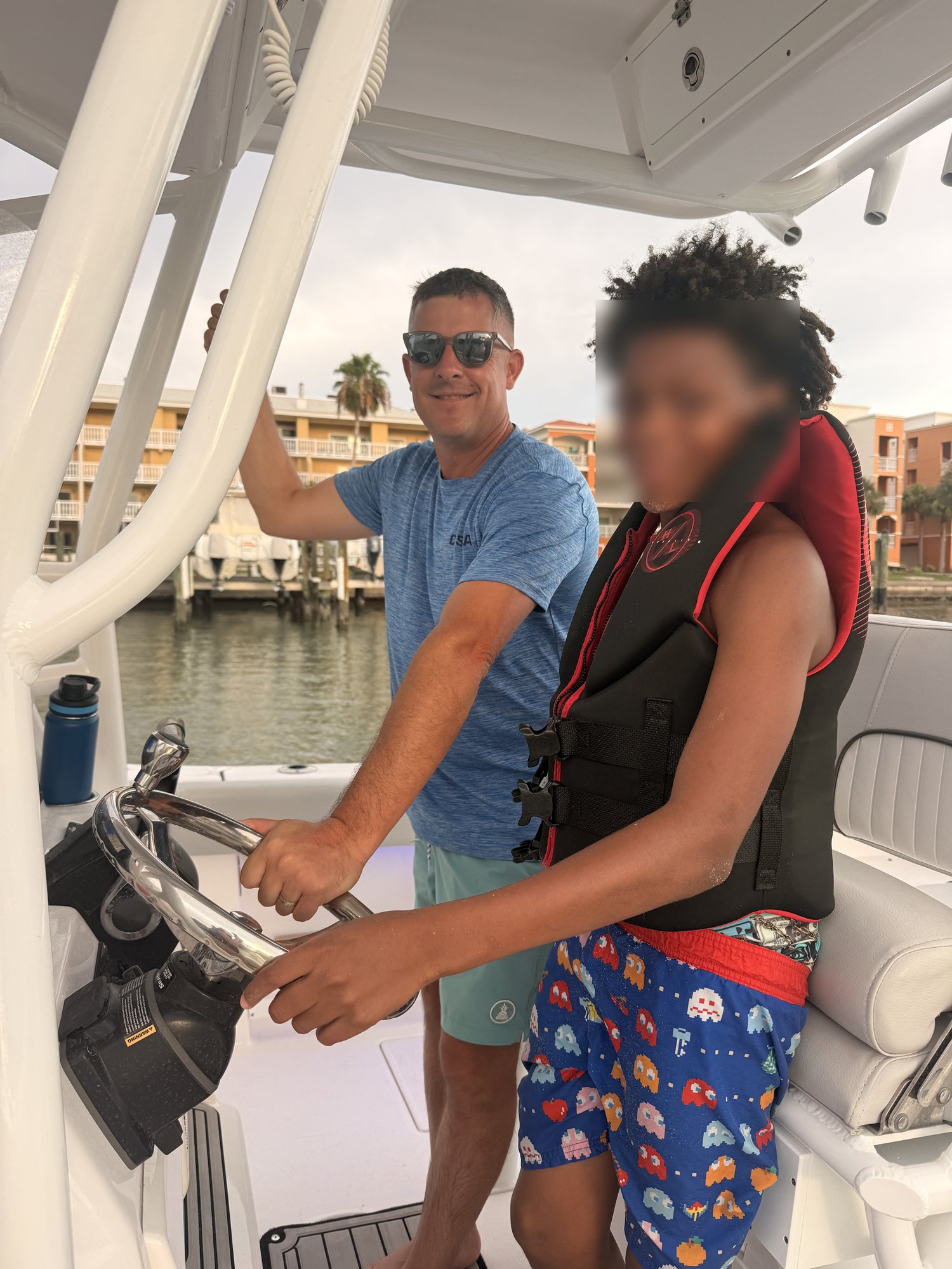 DJ with his Big Brothers Big Sisters mentee out on the water