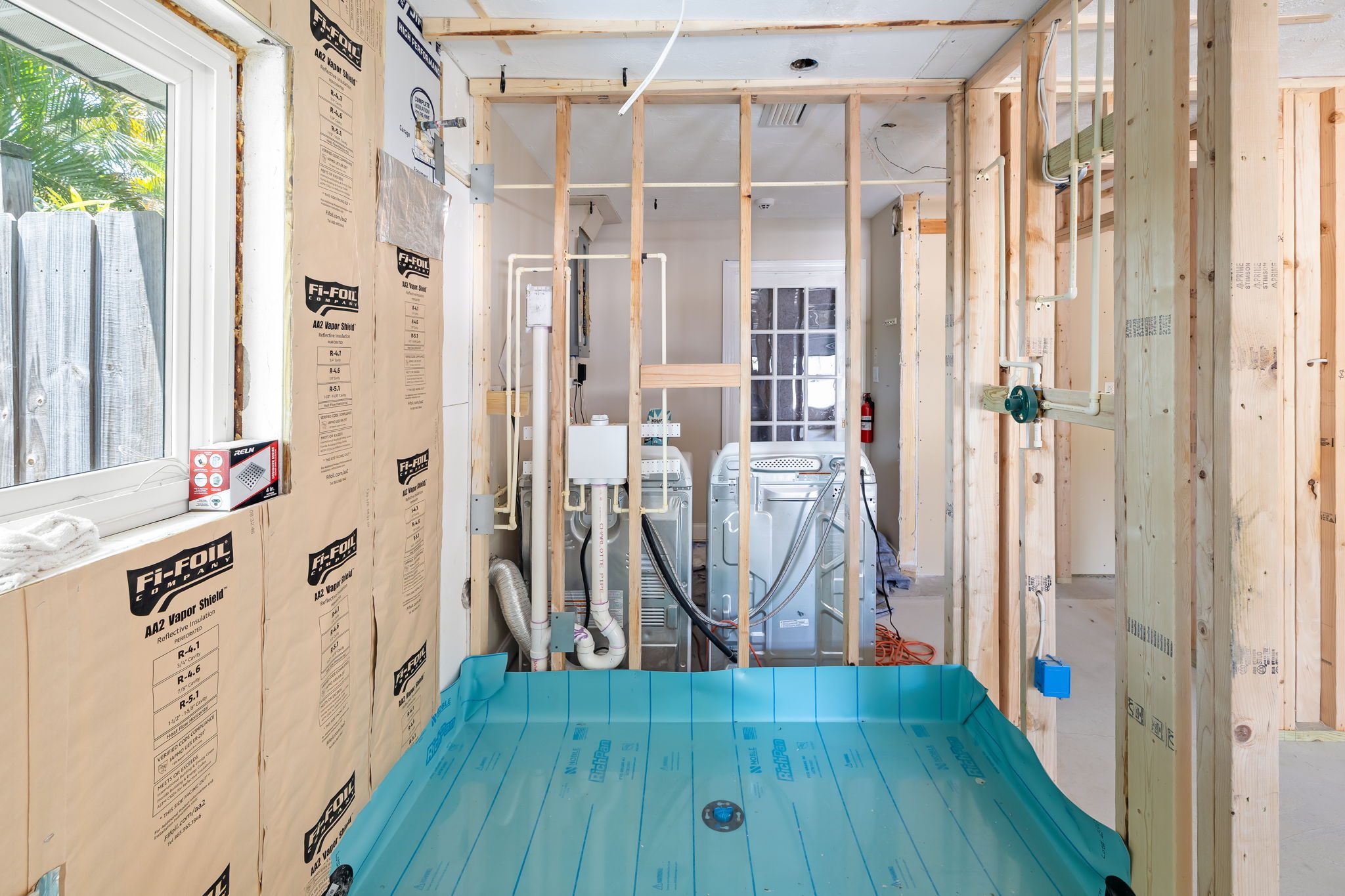 Garage conversion interior framing and utility rough-in