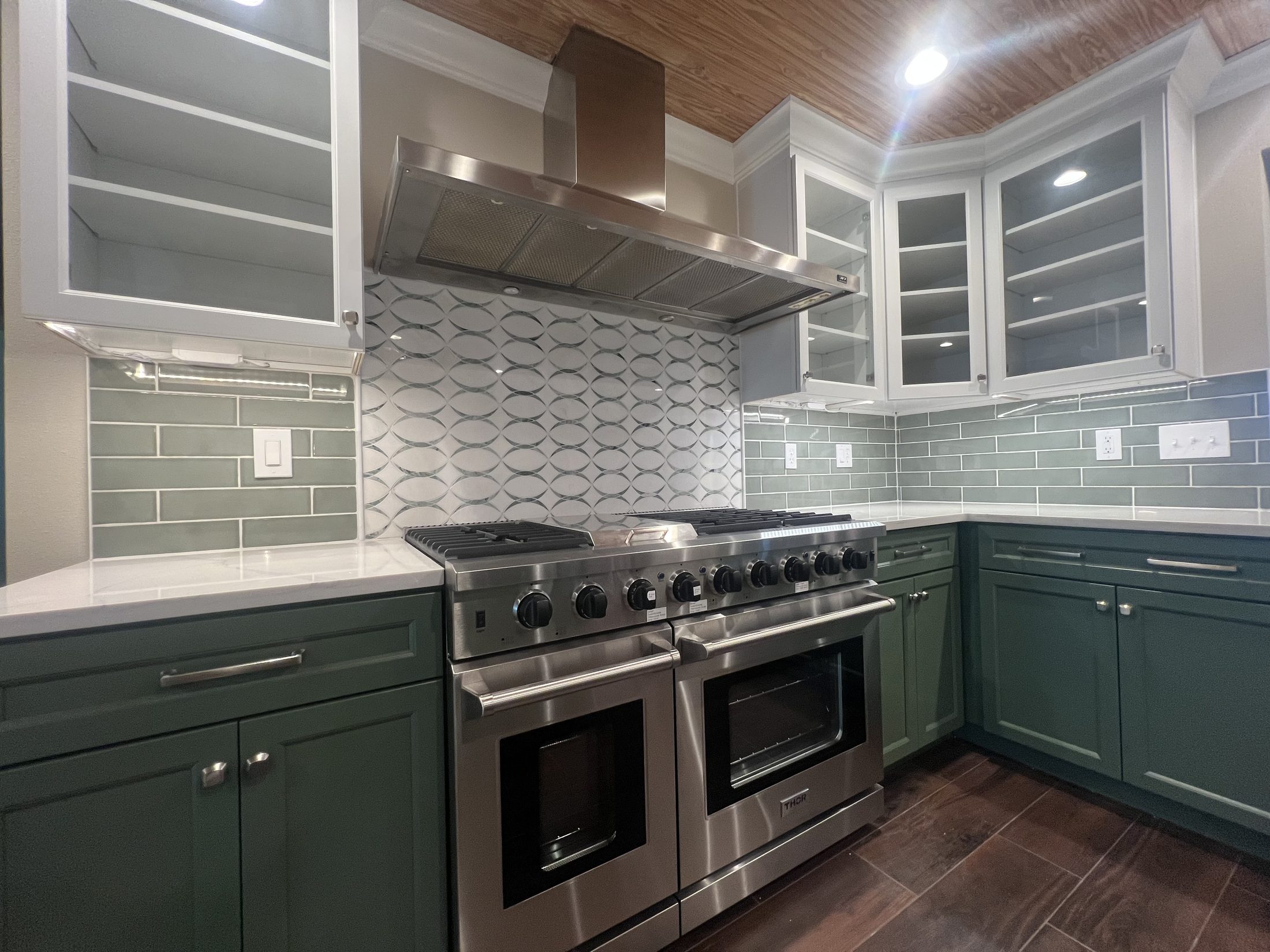 Finished kitchen, wide range and cabinetry view