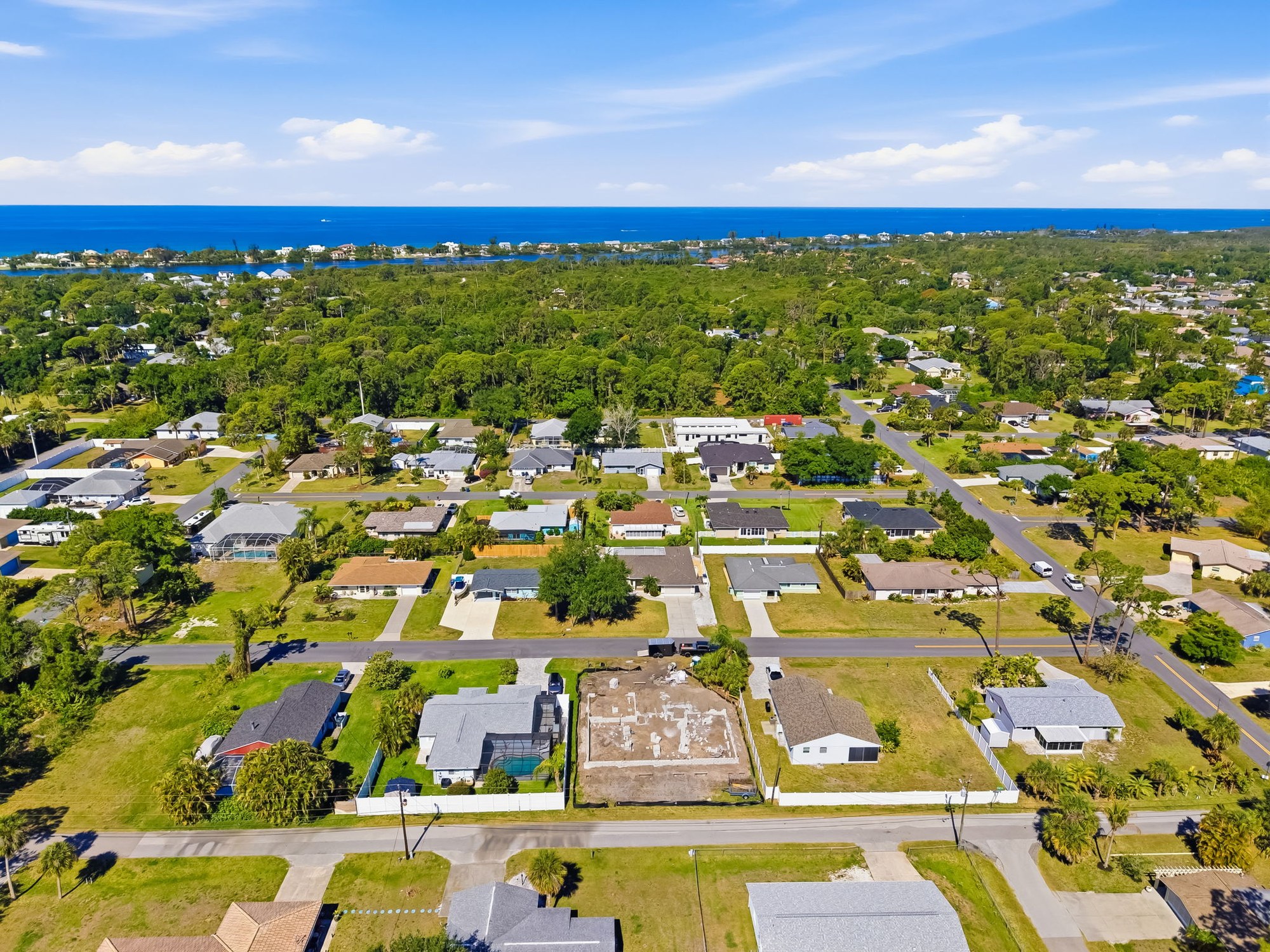 Aerial view of a finished new home build near the Florida coast